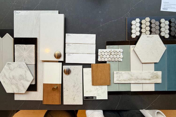Design selections at a client showroom meeting.