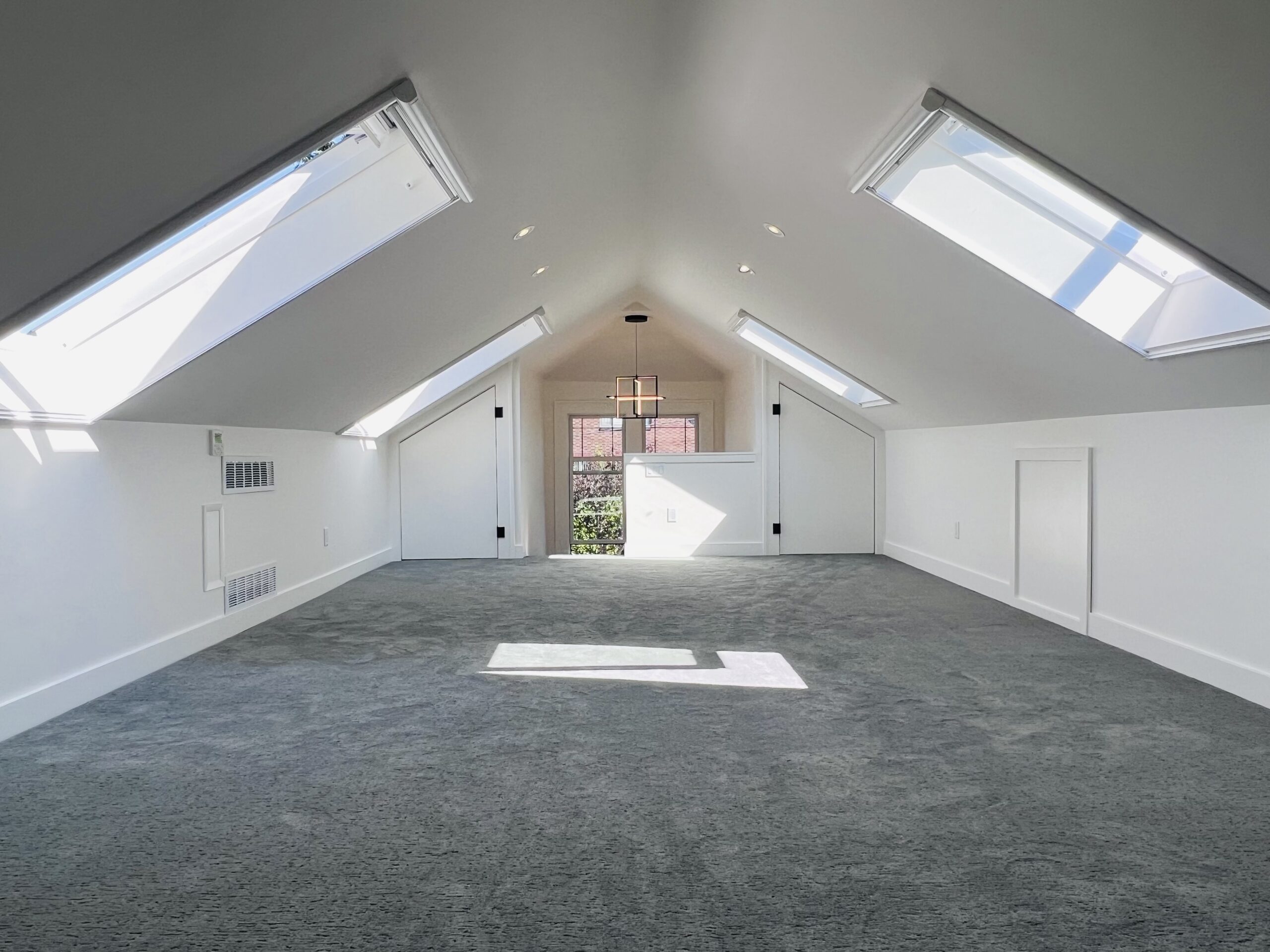 This home improvement project used strategic lighting modifications to transform this previously cramped and confined space. 