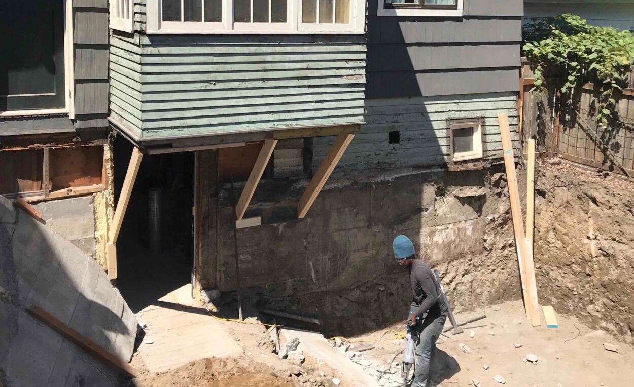 Seattle basement dig out in progress includes structural support and a phased approach