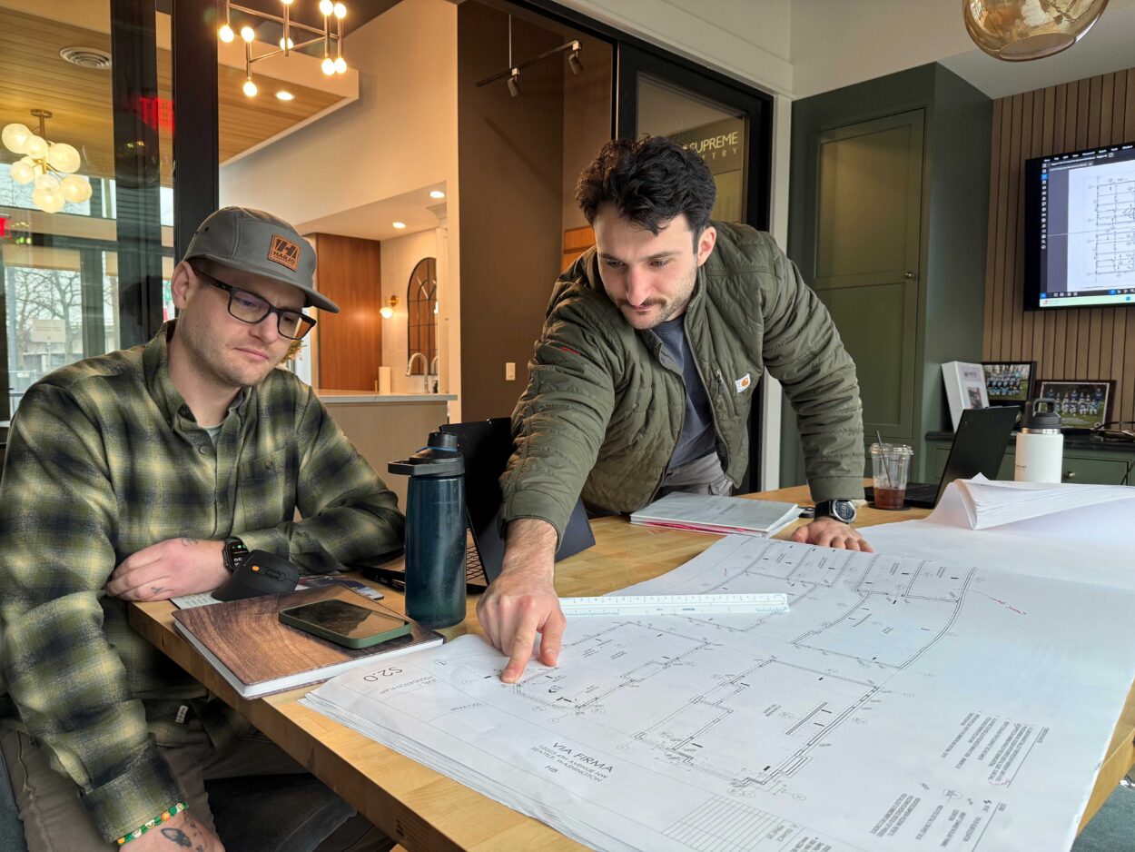 superintendents reviewing structural plans